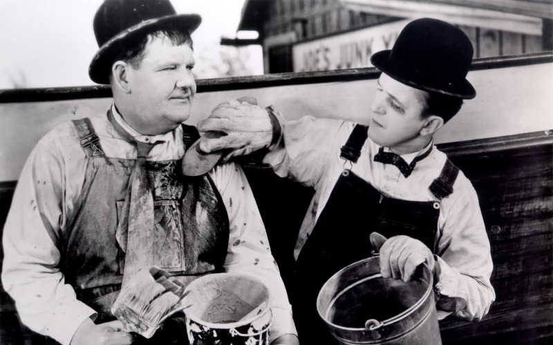 humor, holding, front view, day, movies, man, people, leisure activity, uniform, woman, 720P, Laurel and Hardy, waist up, photo, men, lifestyles, males