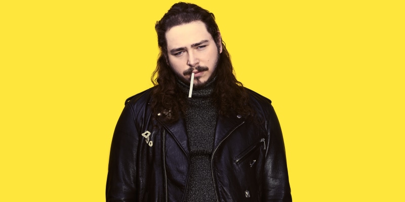 one person, male celebrities, looking at camera, adult, fashion, yellow, 8k, leather jacket, facial hair, 8K, music, jacket, singer, young adult, 4k, clothing