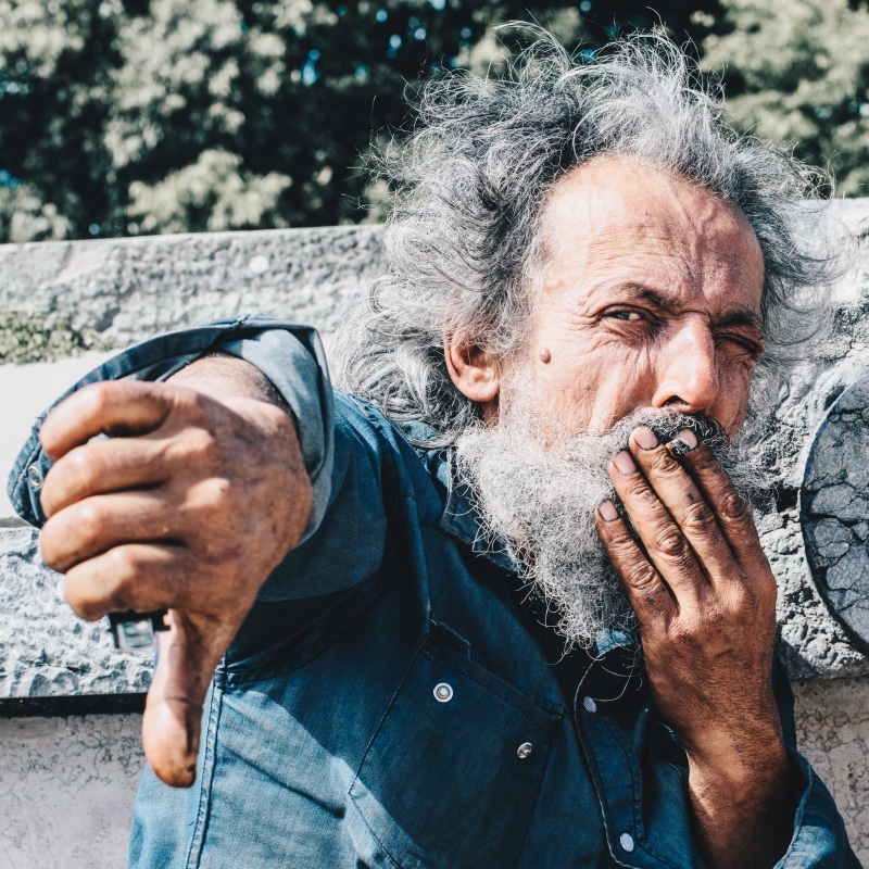 one Person, focus on foreground, mouth, casual clothing, outdoors, senior Adult, one Man Only, males, wrinkled, color Image, Swallowed, front view, people