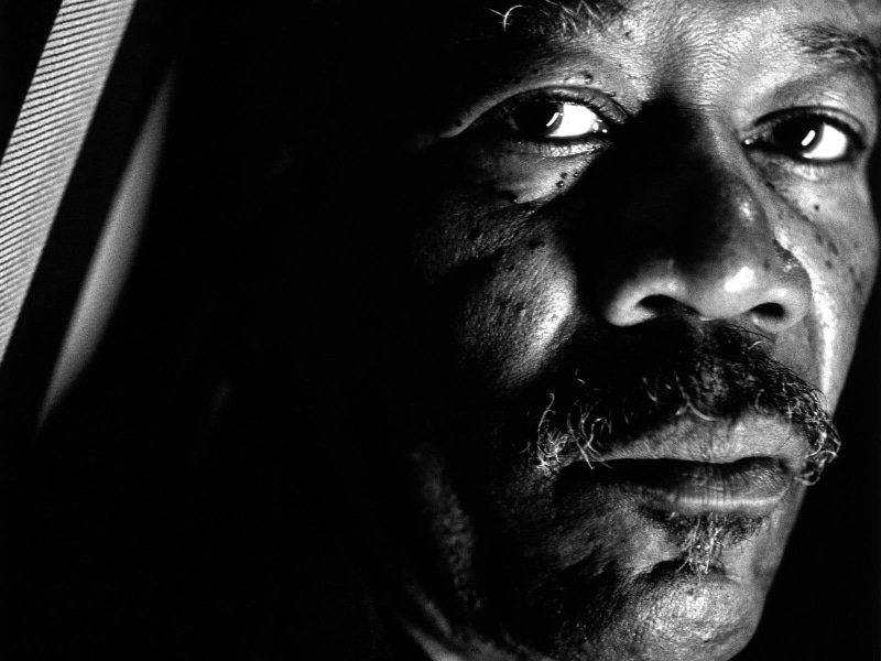 black background, one Person, shock, solitude, emotion, staring, facial Expression, sadness, loneliness, mustache, face, people, males, pensive, looking At Camera