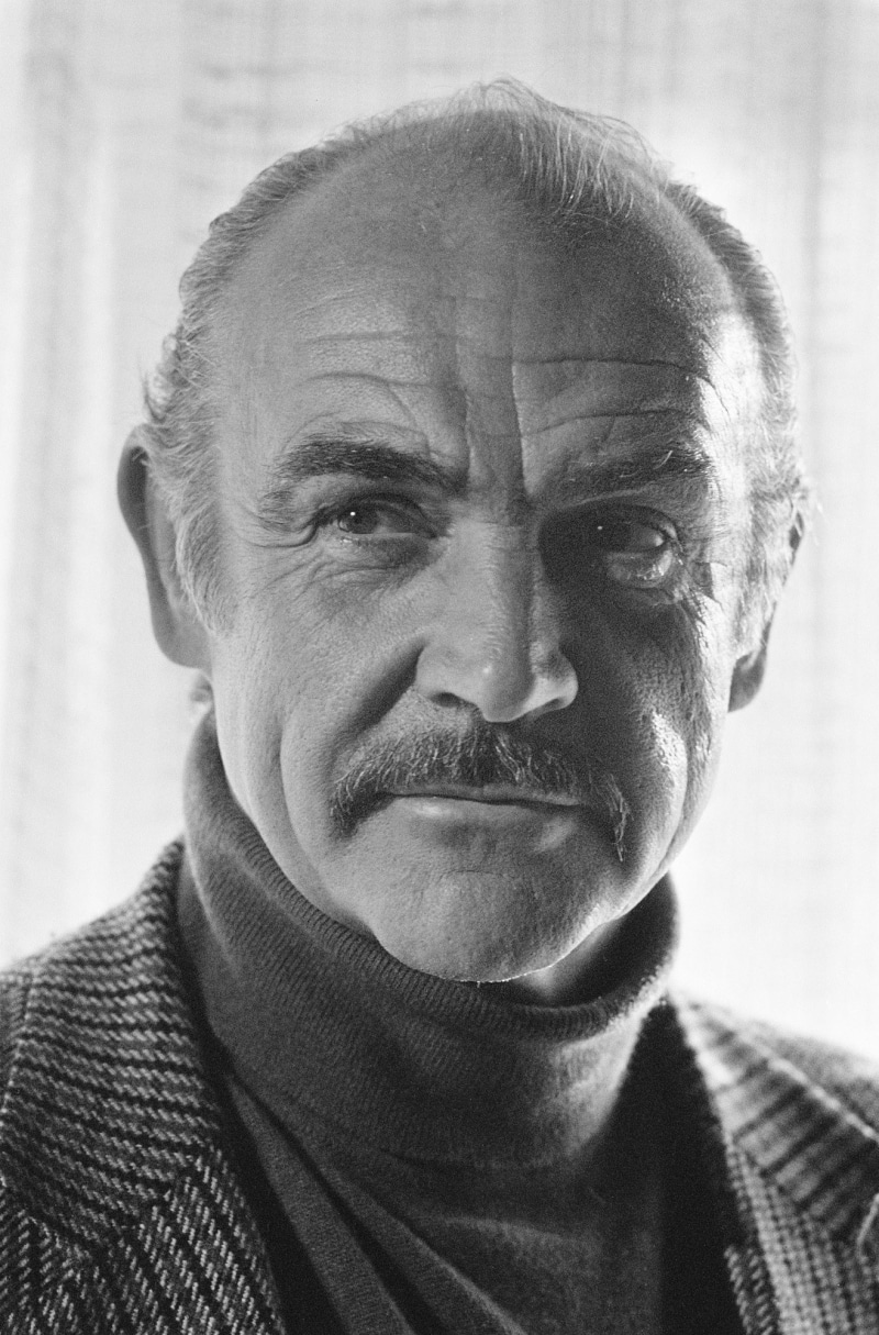 wall, vintage, indoors, james bond, photo, black and white, monochrome, near, males, one person, mature men, smiling, adult, men, human face, focus on foreground