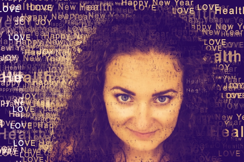 smile, front view, looking at camera, information Medium, number, real people, curly hair, one person, portrait effect, headshot, female, emotion, health