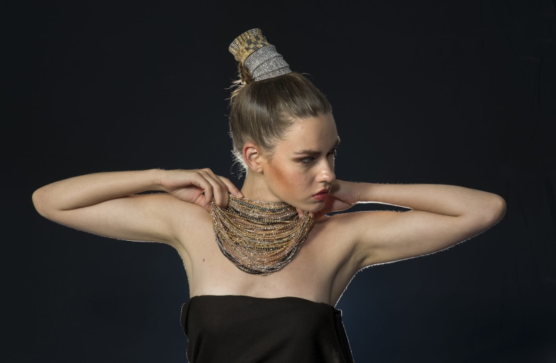 face, adult, waist up, hair, lifestyles, hairstyle, aesthetics, studio shot, 5K, strength, healthy lifestyle, beautiful woman, fashion, necklace, one young woman only