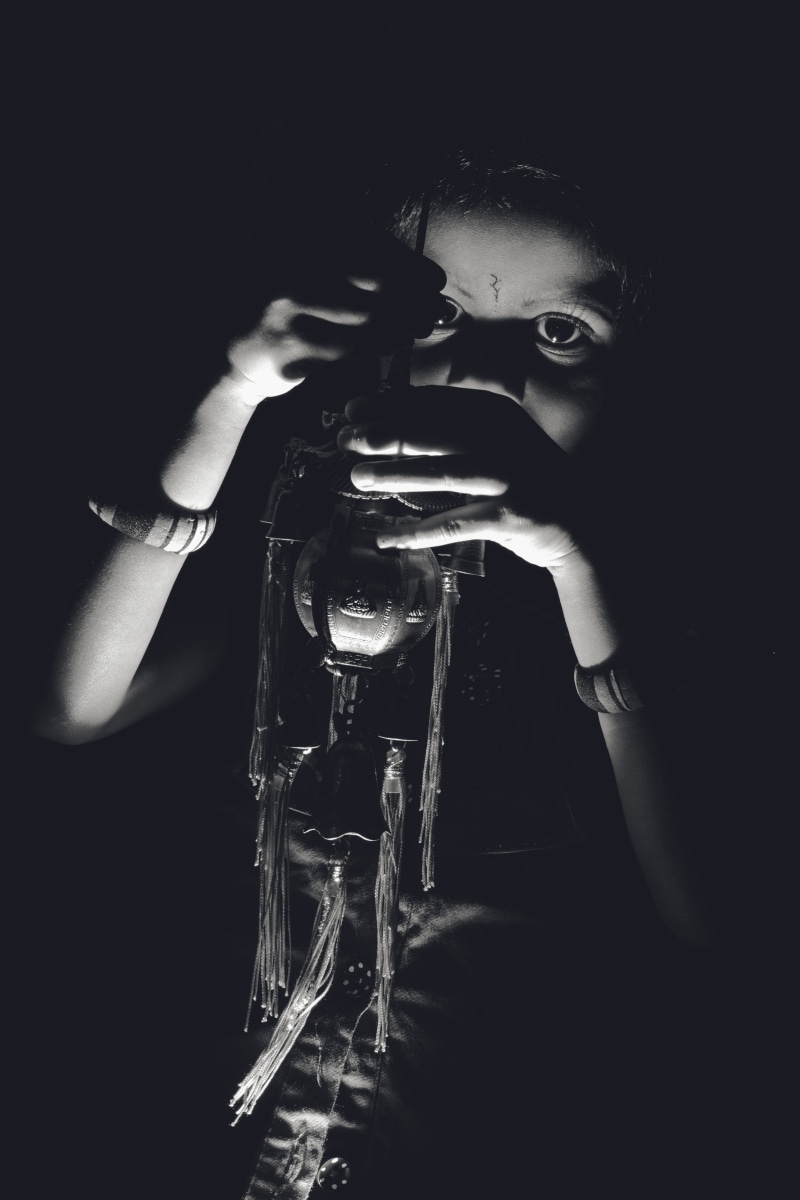 child, indoors, one person, 5K, indian girl, darkroom, headshot, low key, domestic room, balck and white, lifestyles, black background, males, girl, looking at camera