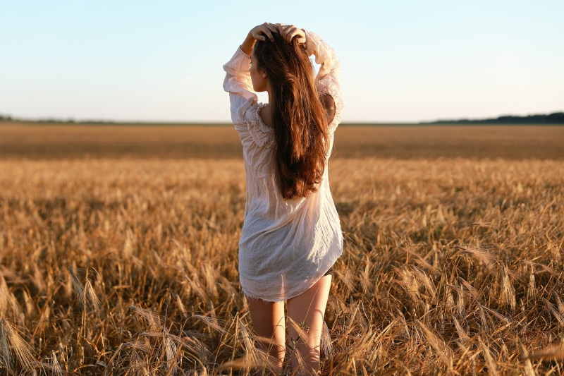 shirt, 2K, women outdoors, depth of field, brunette, hands on head, wheat, outdoors, model, bare shoulders, field, back, long hair, women, sky, short shorts