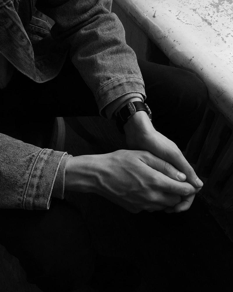 jacket, jeans, royalty  images, wear, person, high angle view, males, denim jacket, hands clasped, black and white, hands, men, wristwatch, emotion, grayscale