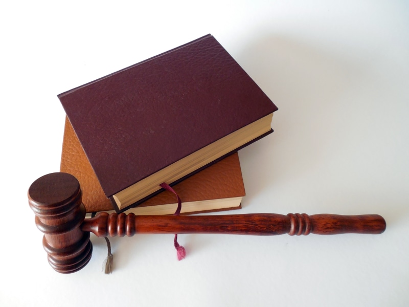 law, available, clause, group of objects, copy space, no people, book, still life, high angle view, §, courthouse, judge - Law, table, judge, auction, legal System