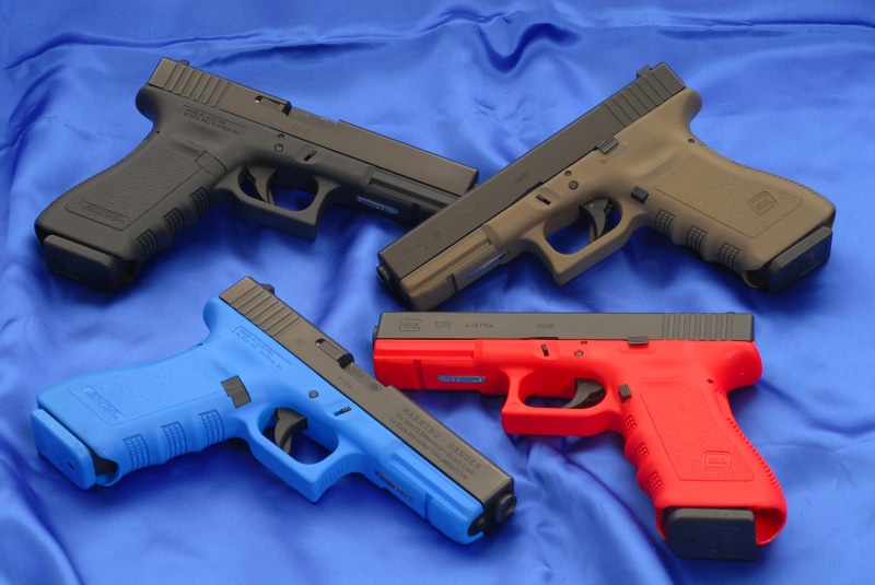 weapon, 17OD, Guns, war, single Object, security, blue, backgrounds, protection, equipment, communication, semi-Automatic Pistol, directly above, semi
