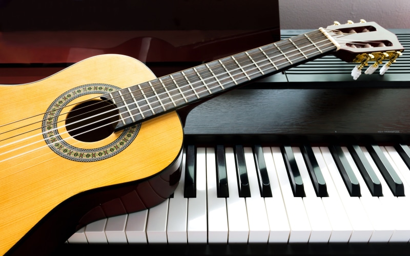 sheet, arts culture and entertainment, classical style, single object, acoustic guitar, still life, piano key, musical instrument, hd, piano, closeup, no people