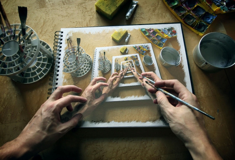 drawing - activity, directly above, women, holding, human hand, high angle view, adult, hands, indoors, paint can, people, paintbrushes, table, skill, creativity