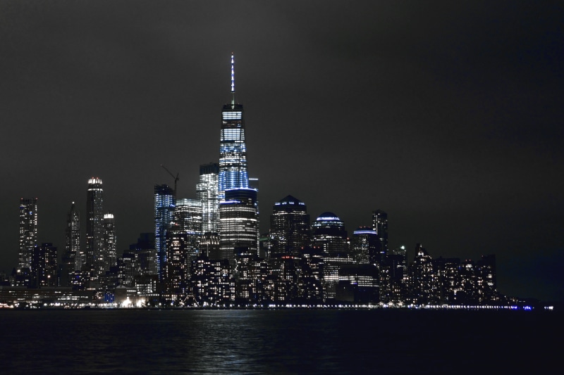 financial district, buildings, illuminated, lights, 8k, outdoors, water, sky, architecture, modern, building, office building exterior, 10k, travel destinations