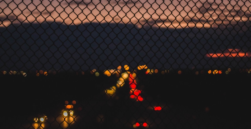 black, security, glare, safety, chainlink fence, fence, illuminated, road, grid, nature, creativity, barrier, night, transportation, architecture, sky