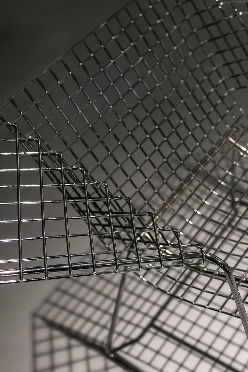 built structure, wire, Metal wire, mesh, close-up, no people, chair, outdoors, steel, barrier, architecture, indoors, design, grid, boundary, metal, protection
