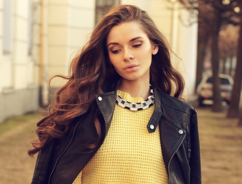 sweater, yellow sweater, long hair, open mouth, 720P, women outdoors, leather jackets, necklace, model, face, women, black jackets, building, brunette