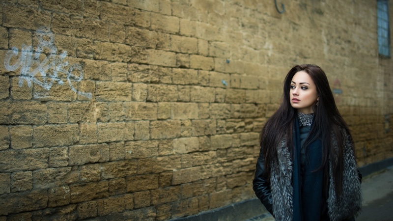 wall, street, outdoors, long hair, portrait, teenager, young adult, wall - building feature, open mouth, 1080P, fur coats, beautiful woman, looking at camera
