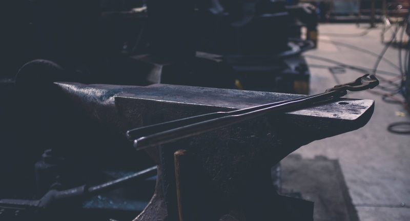 indoors, wood - material, no people, metal, metal industry, craft, day, anvil, workshop, black, retro styled, gray, bench, metalwork, hand, industrial