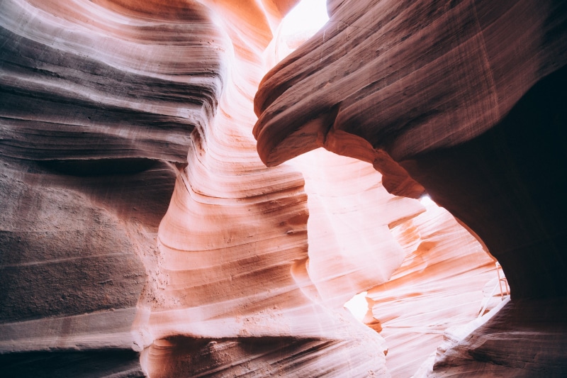 southwest, natural pattern, layered, no people, cave, physical geography, tourism, rock - object, sandstone, time, non-urban scene, natural, tunnel, united states