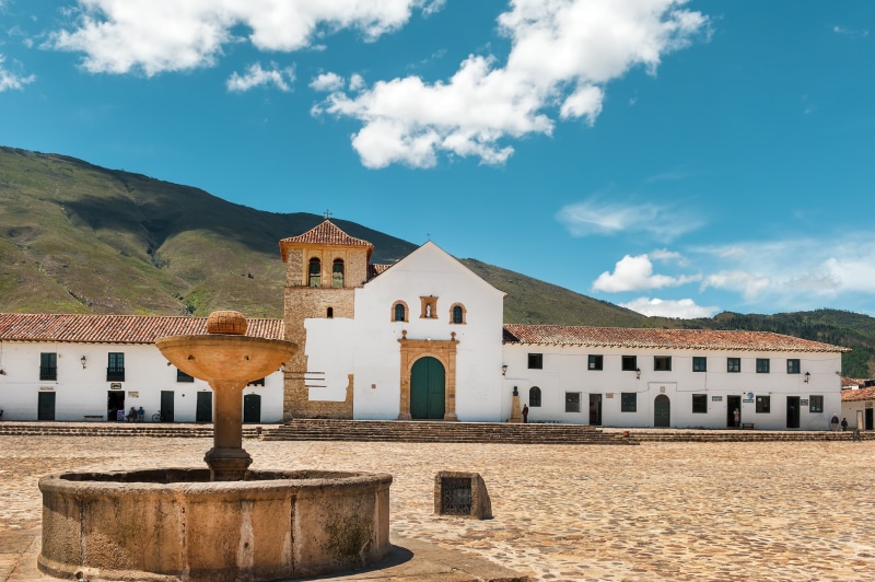 mountain, hills, building, outdoors, the past, blue, architecture, religion, clouds, old building, nature, Villa de Leyva, fountain, built structure, town square