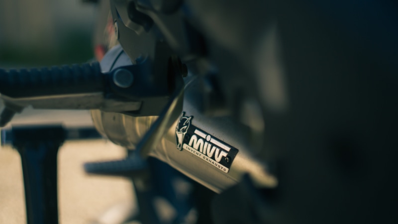 weaponry, motobike, 5K, sign, machine, helios, gun, weapon, outdoors, communication, form of communication, transportation, indoors, brake, wheel, trademark