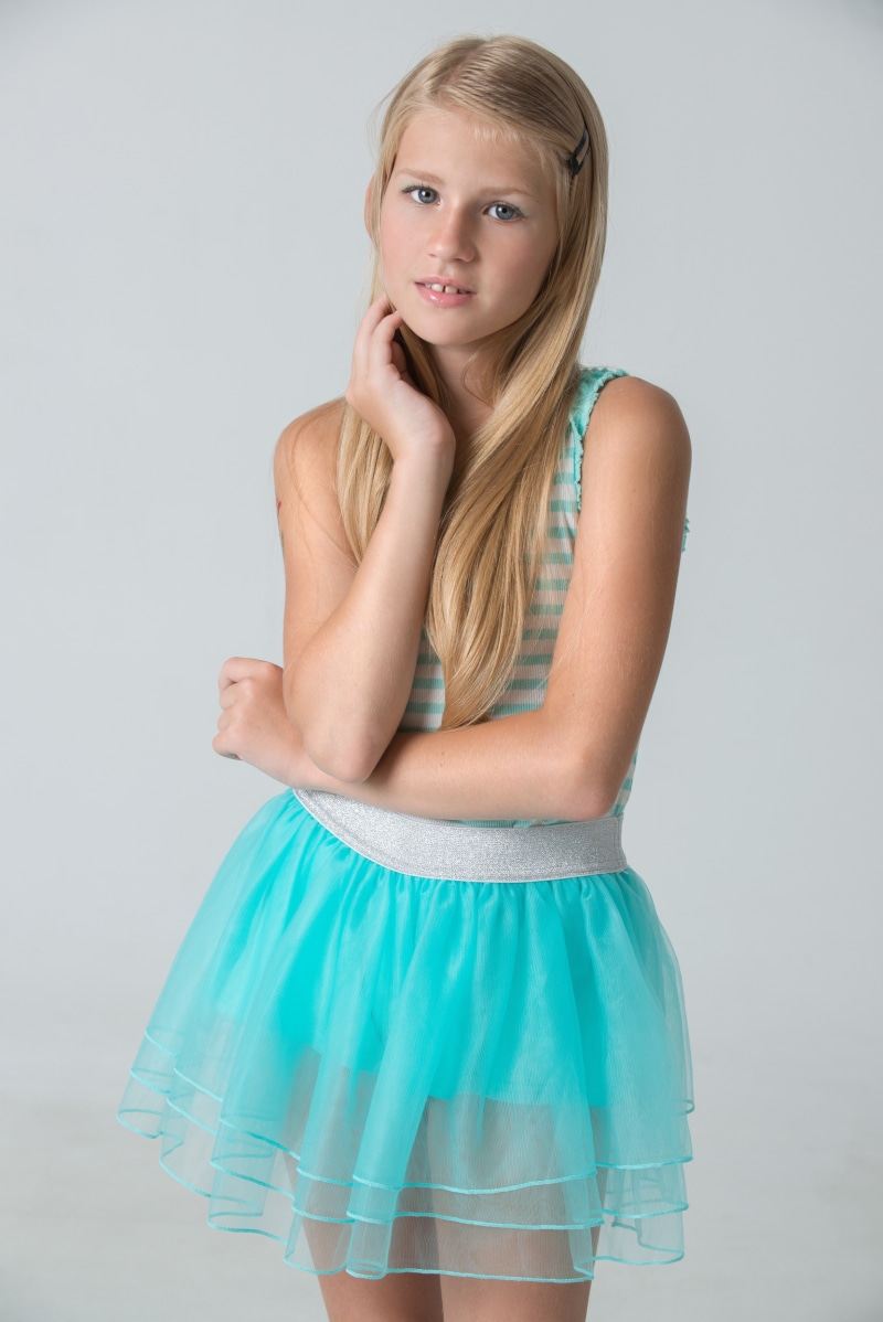 gray background, smiling girl, childhood, in military style, emotions, striped, three quarter length, the little girl, sleeveless, joy, females, one Woman Only