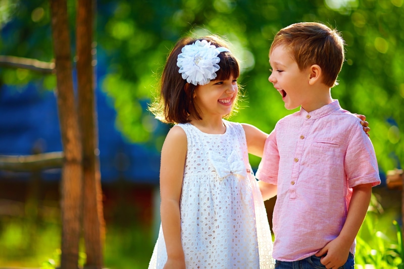 shirt, boy, Smile, 4K, button, children, childhood, girl, smiling, Little girls, Dress, child, hairstyle, positive emotion, outdoors, innocence, focus on foreground