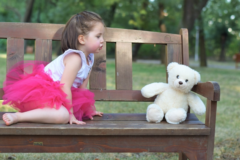teddy bear, stuffed toy, sitting, kid, outdoor, offspring, outdoors, people, wood - material, girl, white, day, photo, summer, hairstyle, plush, innocence