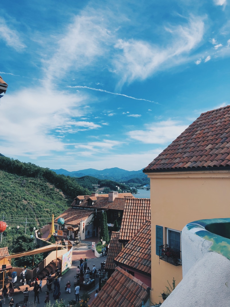 houses, human, architecture, building, mountain, roof tile, adventure, crowd, house, neighborhood, nami island, built structure, korea, residential district