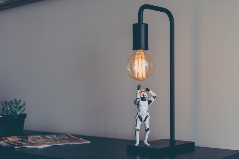 innovation, figure, lamp, bulb, science, single object, electricity, action, funny, bizarre, star, human representation, glowing, light, black
