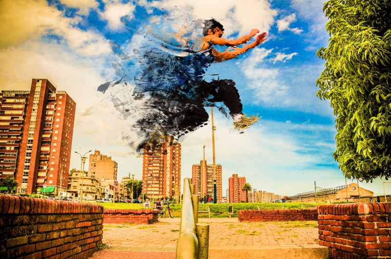 jumping, creativity, disintegration, urban, edited, outdoors, motion, one person, race, sky, sport, built structure, people, skill, day, full length, architecture