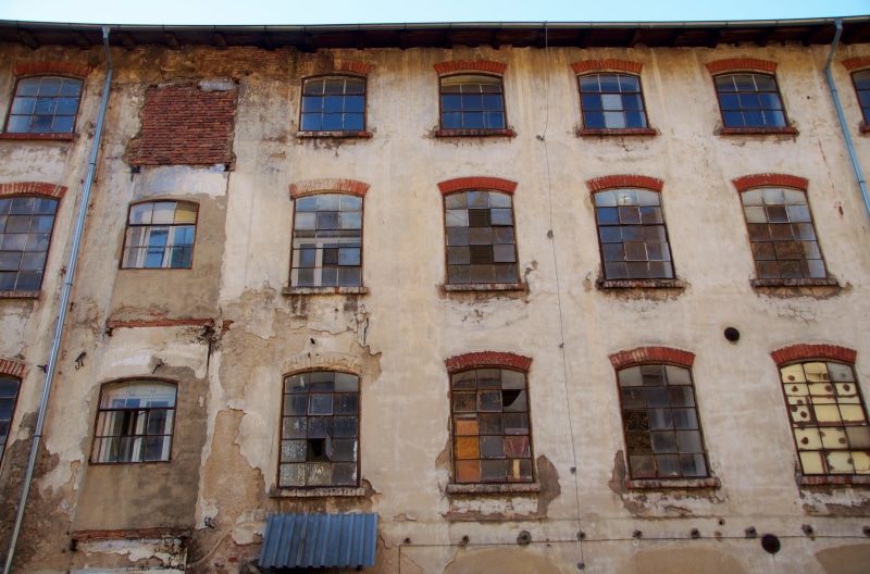 outdoors, low angle view, building, full frame, window, the fringes, apartment, repetition, abandoned, built structure, glass - material, architecture