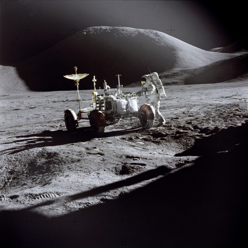 moon rover, mode of transportation, holding, water, land, machine, electronic, nautical vessel, occupation, space, nature, wheels, sand, group of people