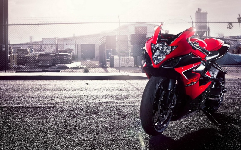crash helmet, selective coloring, road, sunlight, bike, transportation, red, motor scooter, land vehicle, bikes, built structure, city, helmet, architecture
