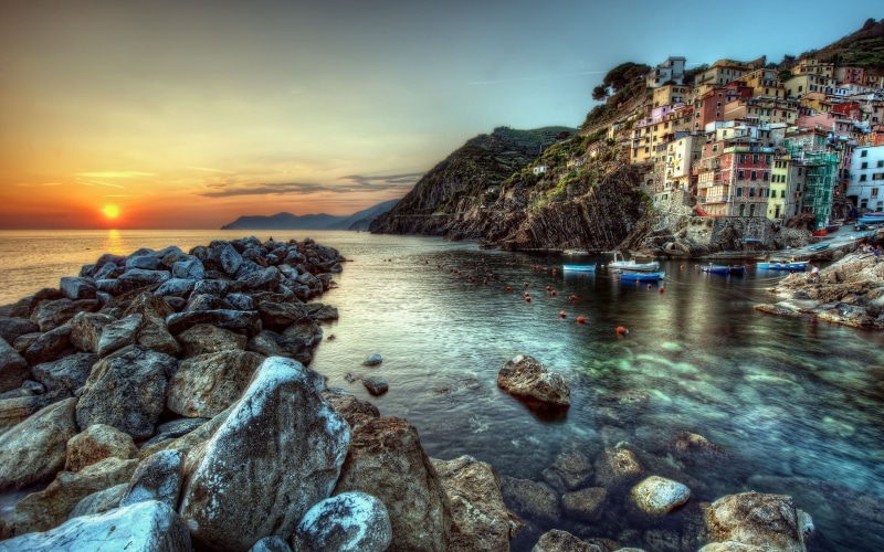 concrete, beauty in nature, beach, solid, rocky coastline, sea, building exterior, tranquility, tranquil scene, sky, water, brown, rock - object, built structure