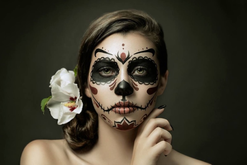 studio shot, 480P, one person, disguise, flower in hair, human face, green eyes, body part, mask, hairstyle, mask - disguise, face paint, young women
