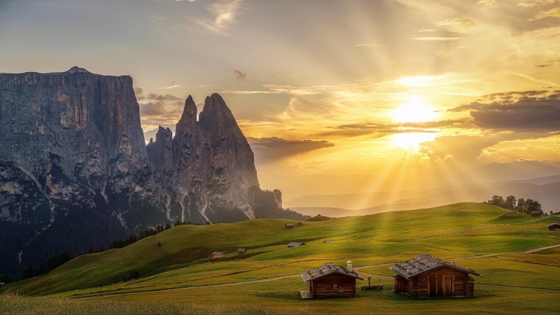 mountain, grassland, log cabin, dolomites, italy, mountain village, sunlight, architecture, scenics - nature, sky, built structure, sunrise, environment