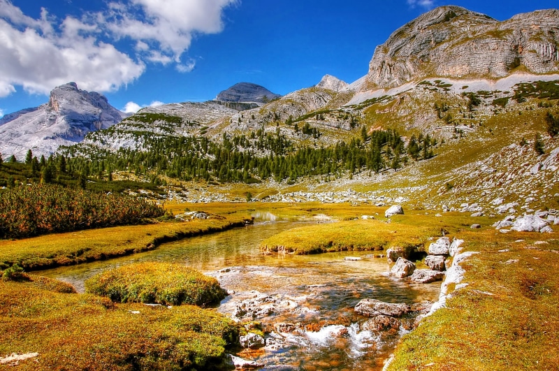 rock, sun, river, plant, snowcapped mountain, green Color, nature, cloud - sky, unesco world heritage, european Alps, summer, solid, sky, tranquility, mountain Range