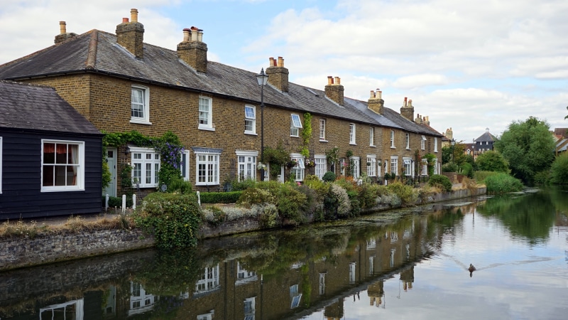 england, no people, home, reflection, landmark, blue, near, garden, grass, calm, architecture, house, brown, rural, city, countryside, country, traditional