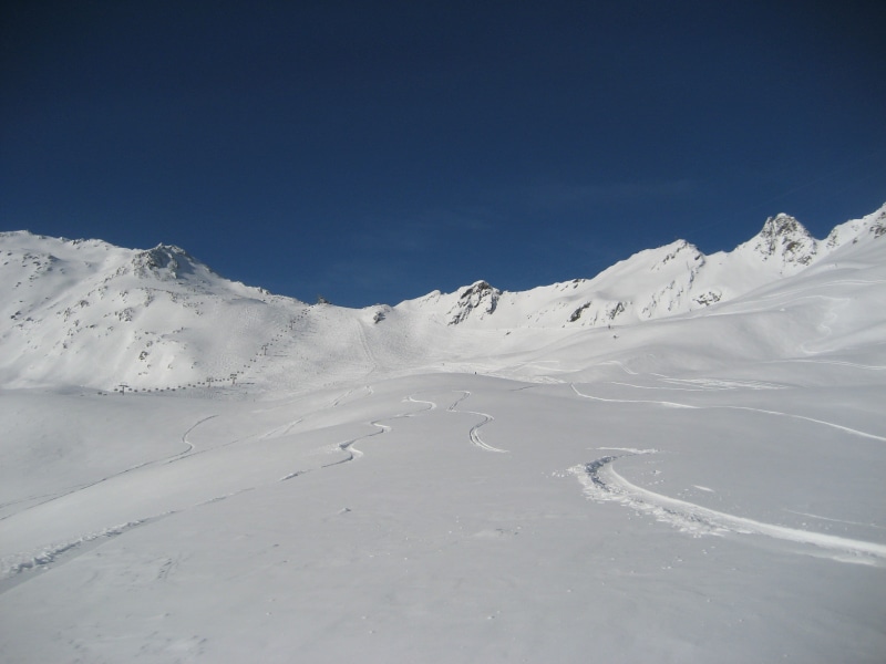 winter blast, mountain, cold temperature, no people, snowboard, snowed in, white color, wide, traces, ski, mountain range, chairlift, non-urban scene, frozen