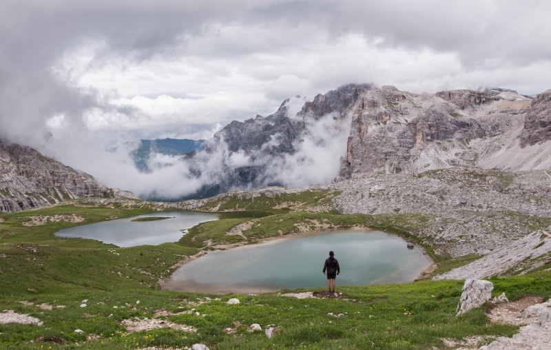 beauty in nature, rear view, green, outdoor, cime, dolomites, rock - object, man, alps, peak, travel, stone, lifestyles, val, high, edge, clouds, mountain