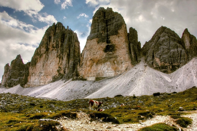 mountain range, full length, mountain hiking, clouds, unesco world heritage, mountain, solid, environment, landscape, sun, cattle, outdoors, brown, sky