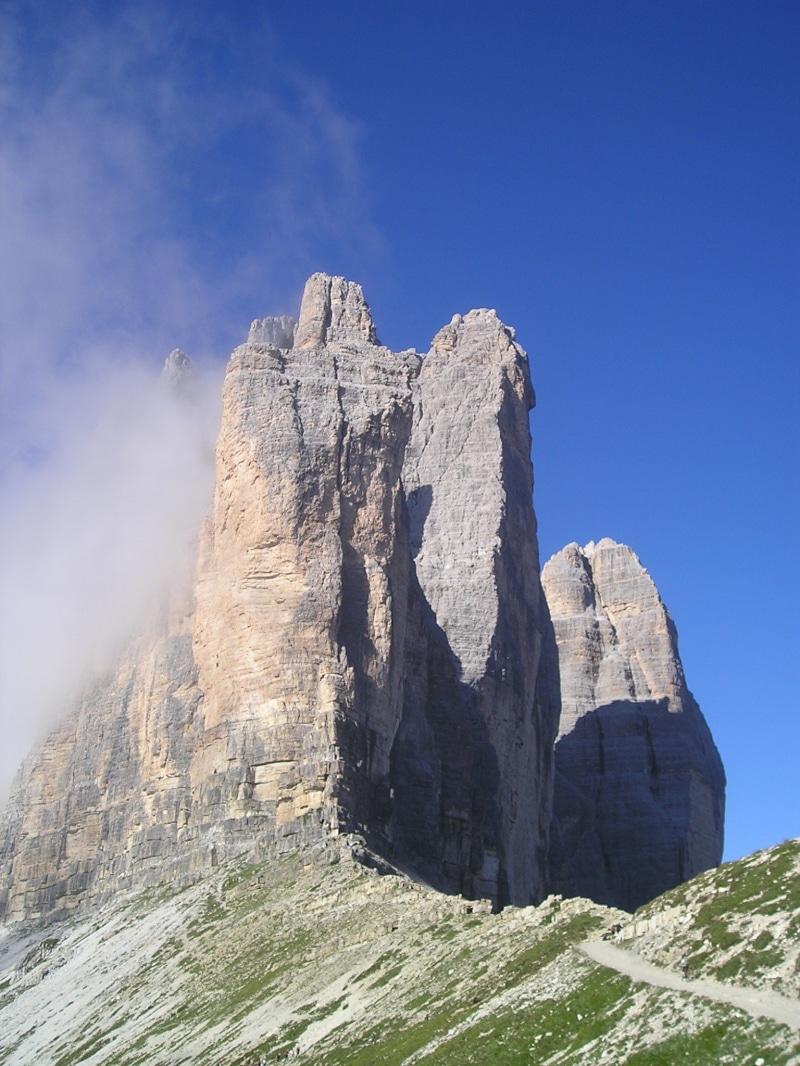 climbing wall, alpine, mountain, rock, eroded, three zinnen, beauty in nature, blue, mountains, no people, dolomites, sunlight, solid, scenics - nature