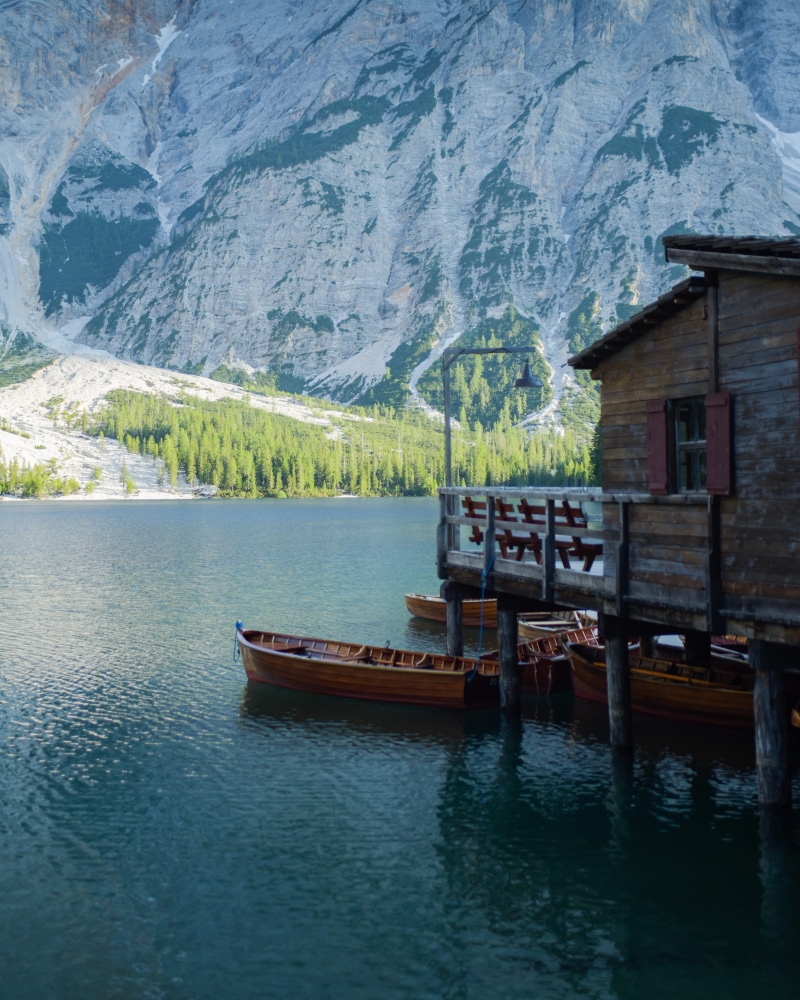 italy, no people, dock, day, lago di braies, shelter, idyllic, pier, architecture, mountain range, waterfront, countryside, vehicle, transportation, tranquility