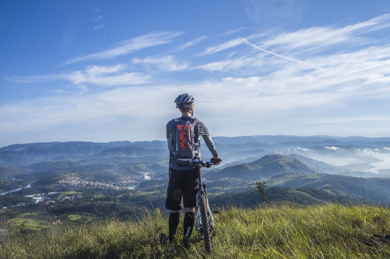 brazil, leisure activity, rear view, range, activity, visual, sky, idyllic, outdoors, mountain range, horizon, tranquility, bicycle, sport, mountain, person