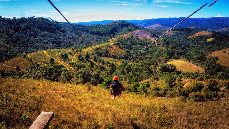 rear view, vegetation, radical, serra, outdoors, zipline, line, mountain range, environment, full length, zip, sky, activity, scenics - nature, holidays