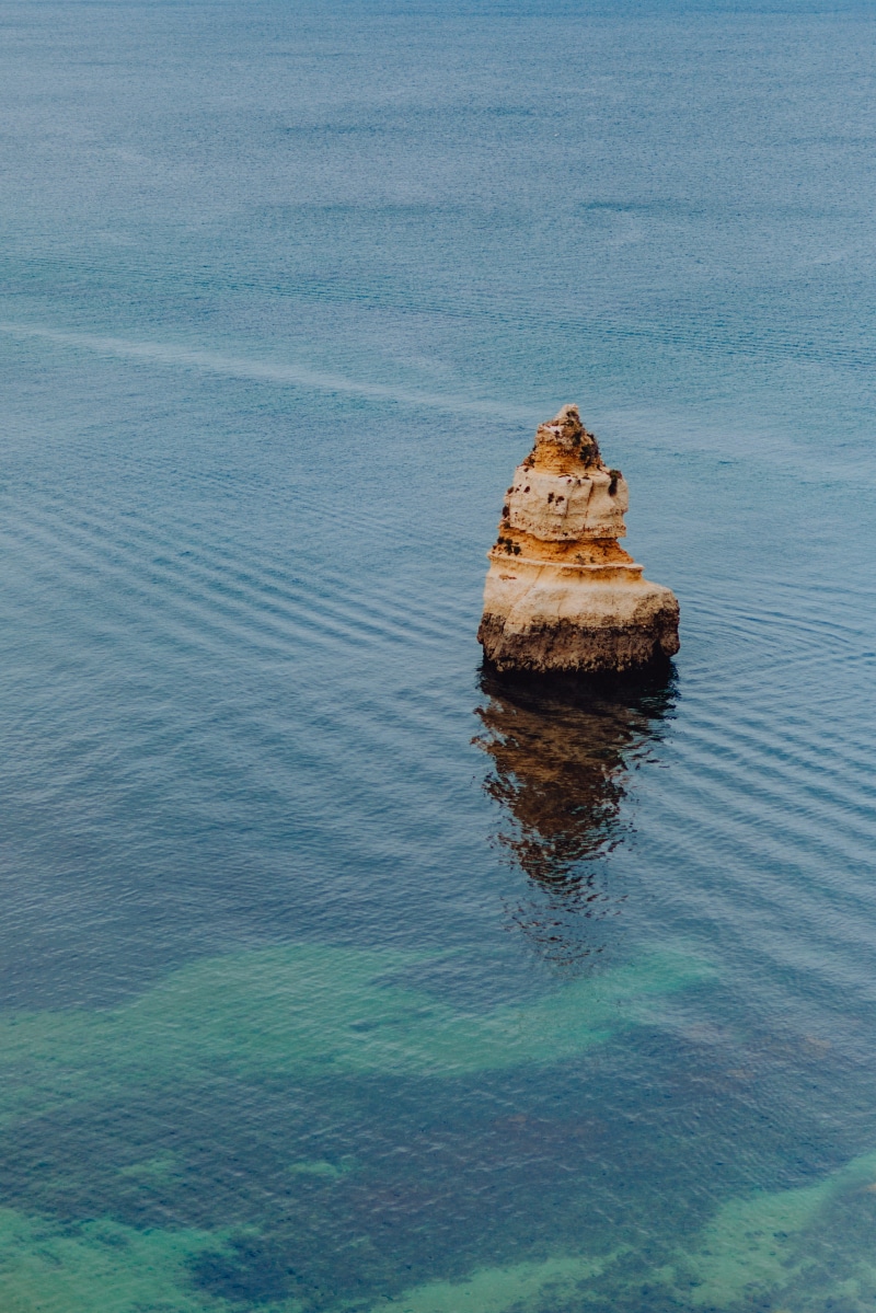 nature, scenics - nature, blue, animal wildlife, ocean, rock - object, beach, Lagos, portugal, water, vacations, high angle view, waterfront, non-urban scene