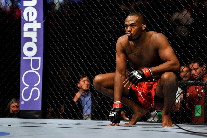 sweat body, real people, competition, lifestyles, squatting, mma, young adult, match - sport, leisure activity, adult, UFC, athlete, Jon Jones, exercising