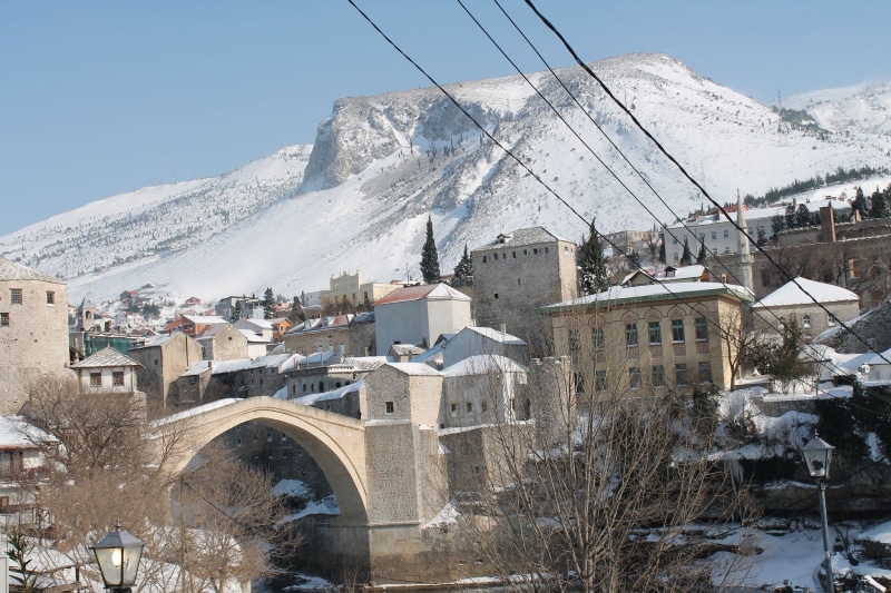 cold temperature, winter, architecture, snowcapped mountain, city, river, Bosnia and Herzegovina, Mostar, day, mountain range, nature, frozen, old bridge