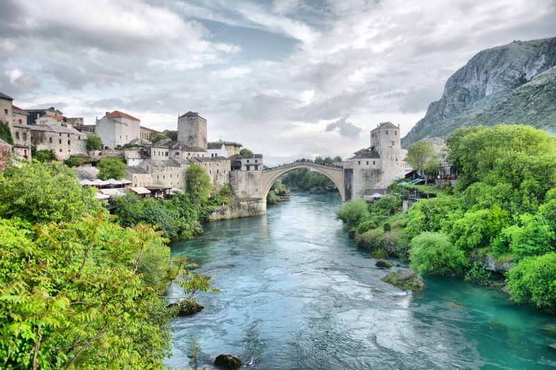 tree, travel Destinations, old bridge, travel, ottoman, cloud - sky, hdr, water, 5K, architecture, blue, mostar, sky, body, scenics, attraction, bridge