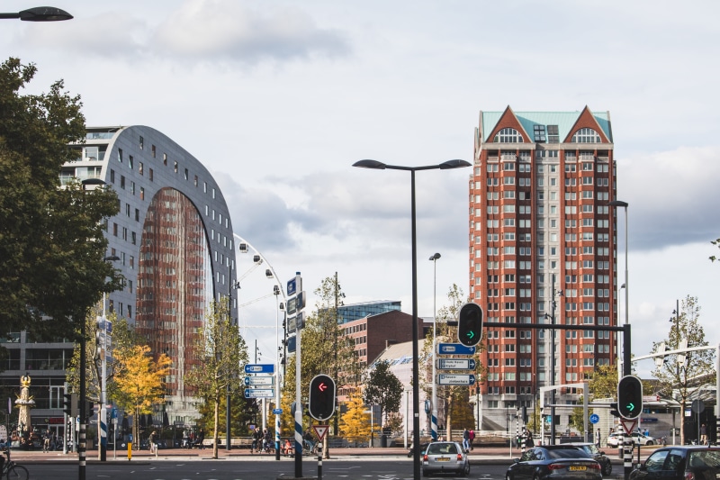 trafic, sign, nature, street light, road, land vehicle, outdoors, rotterdam, cloud - sky, tree, built structure, contrast, day, markthal, 5K, modern, sightseeing