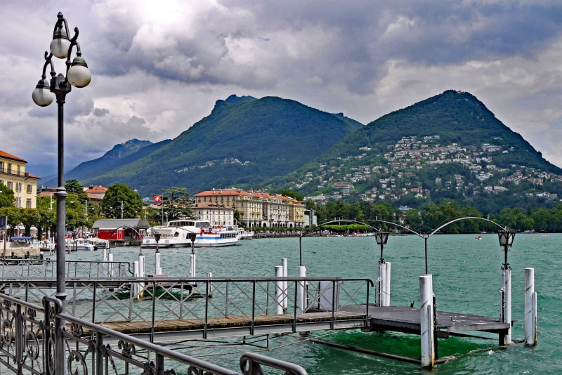 beauty in nature, travel destinations, lake lugano, scenics - nature, railing, Promenade, 4K, mode of transportation, building exterior, outdoors, city